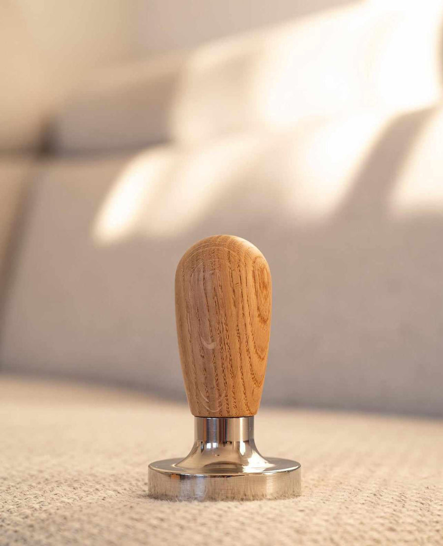 Tamper och tamperhandtag