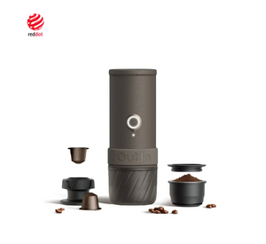 Portabel espressomaskin i canyon green med kapslar, malet kaffe och tillbehör, från senaste nytt och portabla kaffebryggare.