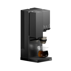 Svart xBloom kaffebryggare med glasbehållare och digital display för precisionsbryggning allt om kaffe
